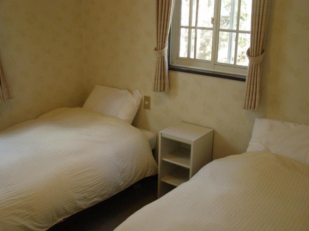 Sunny Side Hut Bed and Breakfast Hakuba Værelse billede